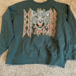 def leopard crewneck